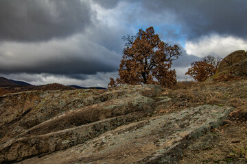 Raven Peak; Giant stones fragments in the mountain near the Thracian tomb. Bulgaria 