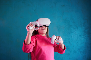 little girl playing with VR glasses