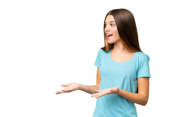 Teenager girl over isolated chroma key background with surprise expression while looking side