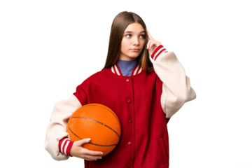 Teenager girl playing basketball over isolated chroma key background having doubts and thinking