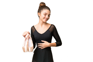 Teenager girl practicing ballet over isolated chroma key background smiling a lot