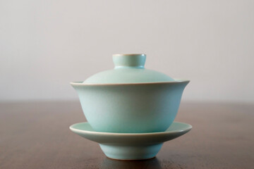 Green tea cups are isolated on the dining table