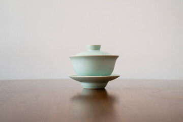 Green tea cups are isolated on the dining table