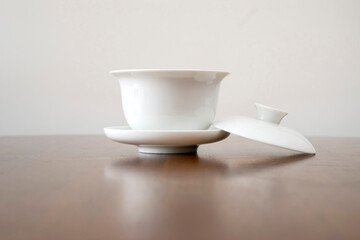 White teacups were isolated on the dining table