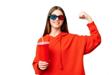 Teenager girl in a cinema over isolated chroma key background doing strong gesture