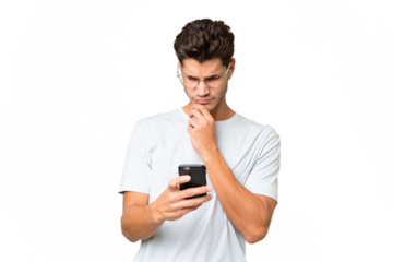 Young caucasian handsome man over isolated background thinking and sending a message