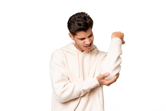 Young caucasian handsome man over isolated background with pain in elbow