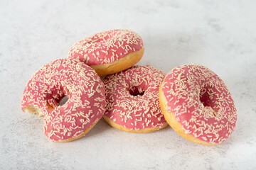 pink donuts, sweet dessert on a light background