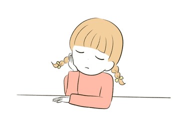 頬杖をついて考え事をする女の子