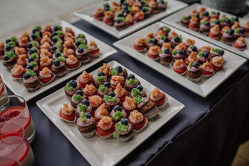 various snacks laid out on a buffet table