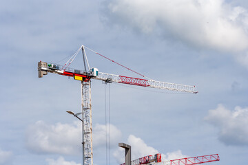 Construction crane. Industrial machinery and the construction crane. Building new skuscrapper. Engineering industry