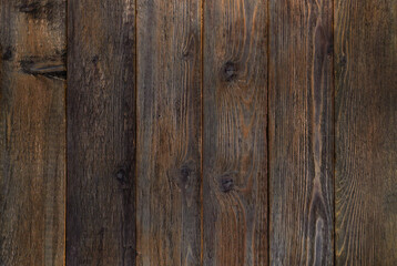 Obraz premium Wooden background texture. old dark brown burnt boards.