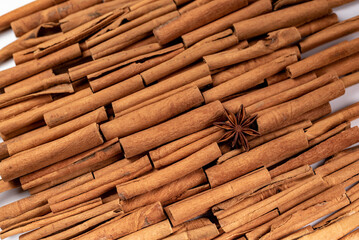 Star anise lies on a large number of cinnamon rolls