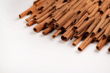 Cinnamon rolls lie on a white background, top view