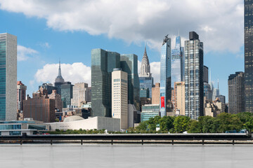 Fototapeta na wymiar Skyscrapers Cityscape Downtown, New York Skyline Buildings. Beautiful Real Estate. Day time. Empty rooftop View. Success concept.