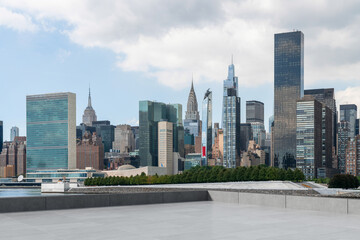 Fototapeta premium Skyscrapers Cityscape Downtown, New York Skyline Buildings. Beautiful Real Estate. Day time. Empty rooftop View. Success concept.