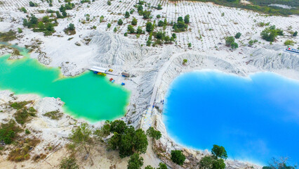 Beautiful kaolin lake in Bangka Indonesia, Blue lake kaolin quarry with turquoise water
