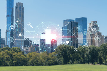 Green lawn at Central Park and Midtown Manhattan skyline skyscrapers at day time, New York City, USA. Health care digital medicine hologram. The concept of treatment and disease prevention