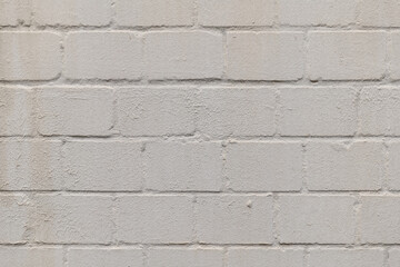 a white brick wall with a view from the front