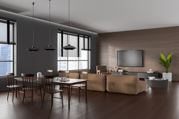 Dark living room interior with dining and relaxing area near panoramic window