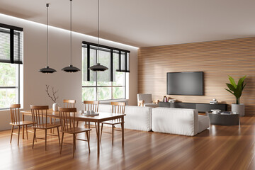 Stylish living room interior with dining and relaxing area near panoramic window