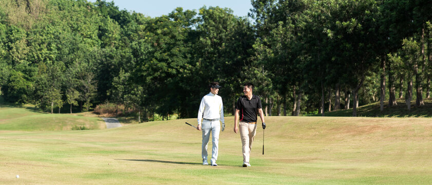 Group Golf Professional Golfer Asian Man Walking In Fairway With Bag Golf At Golf  Club.  Hobby In Holiday And Vacation With Friends.  Lifestyle And Sport Concept