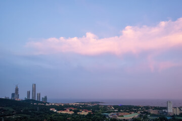 Sunset natural landscape and urban skyline