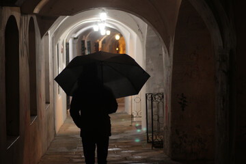 Person under umbrella, Podcienie in Bielsko-Biala, Poland