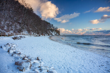 Beautiful landscape of the cliff in Gdynia Orłowo in snowy winter, Baltic Sea. Poland