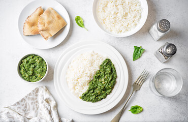 Spinach dahl with rice in a plate