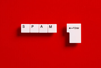 Online spam messages or sending spam messages concept. Computer keyboard keys with the word spam.