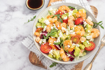 Avocado shrimp salad with cherry tomatoes