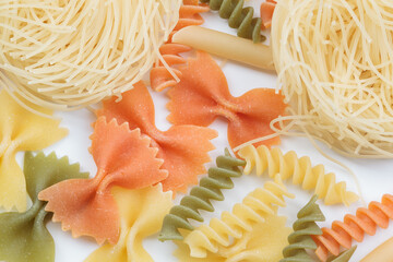 Tricolor macaroni of different types.