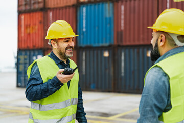 Industrial engineers working in logistic terminal of container cargo