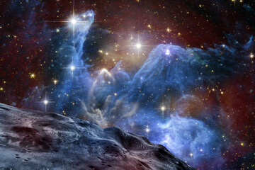 Alien planet landscape and space clouds among the stars. Elements of this image furnished by NASA.