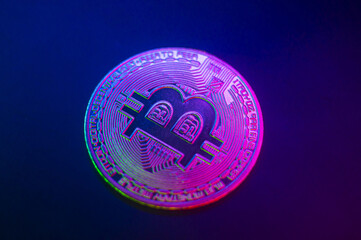 Crypto currency golden coin with bitcoin symbol on black background. Bitcoin Coin on black background. Bitcoin cryptocurrency. Cryptocurrency Coin Concept. single golden valuable. left bottom