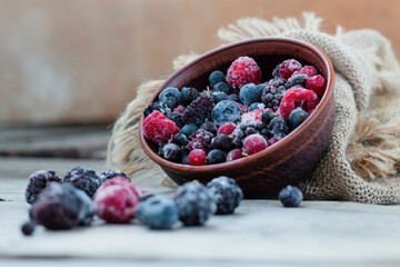 Frozen berries in a bowl, close-up