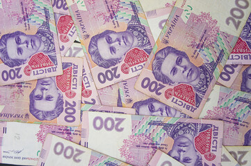 Ukrainian money background. banknotes with a face value of 200 hryvnia money background. Ukrainian money. Business concept. Background with hryvnia.