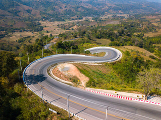 Top view Aerial photo from flying drone over Mountains and winding mountain paths exciting steep at Phu Kao Ngom,Na Haeo City,Loei Province,Thailand,ASIA.