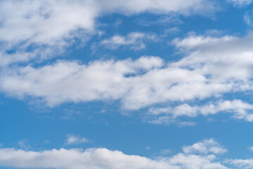 Naklejka na ściany i meble blue sky with clouds. wallpaper and background