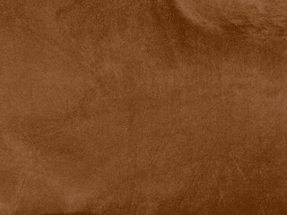 Brown color velvet fabric texture used as background. Empty brown fabric background of soft and...