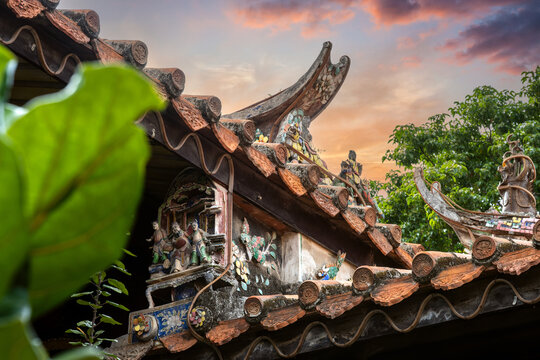 South Fujian historical house roof in sunrise sky