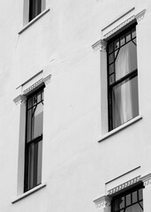 Beautiful residential white painted building with architectural detail, photographed in Hampstead, London UK.