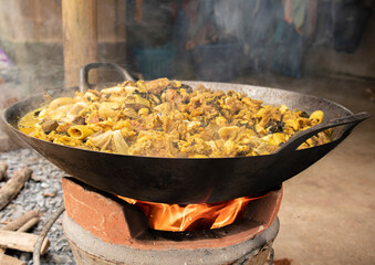 Big pan beef red curry on the stove, selective focus