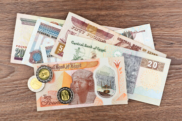 Egyptian pounds - banknotes and coins 
 - obrazy, fototapety, plakaty