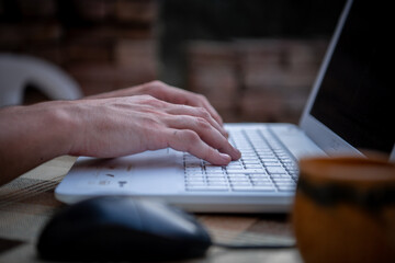 Man Using his Laptop