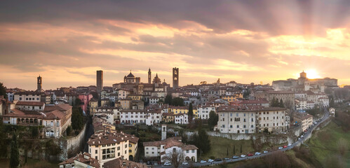 High point of view at buildings in Bergamo Alta during beautiful sunset, Lombardy Italy.