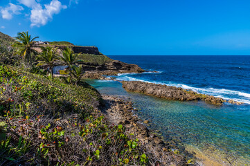 Fototapeta na wymiar A view up the Capital Beach in San Juan, Puerto Rico on a bright sunny day