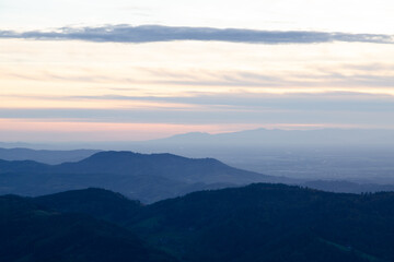 top view of hills and valley against sunset sky