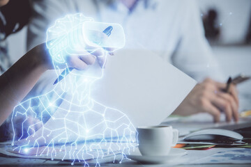 Double exposure of AR glasses drawing over people taking notes background. Concept of VR